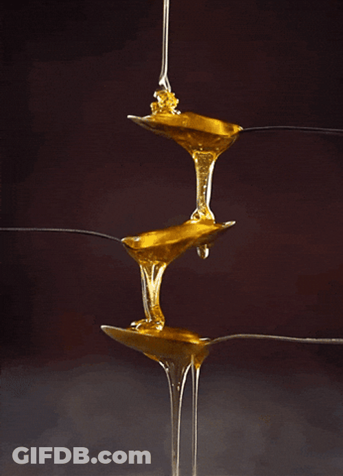 Honey On Spoons Continuous Pour GIF
