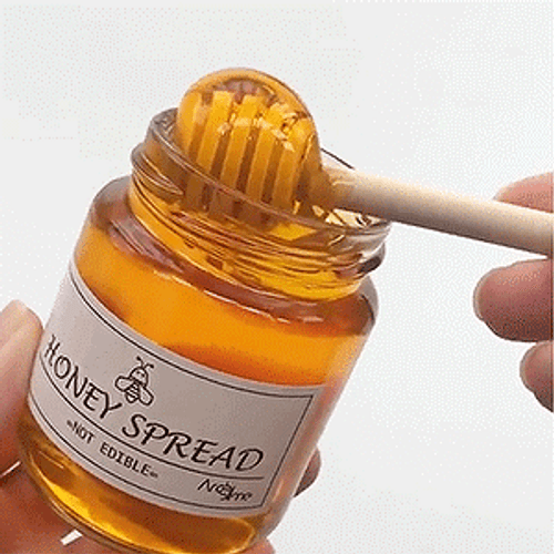 Honey Spread Being Scooped Out Of Jar GIF