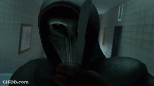 Hooded Figure Holding Knife GIF