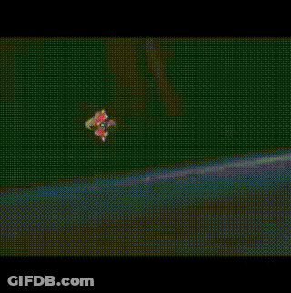 Hooded Helmet Video Game Character In Dark Room GIF