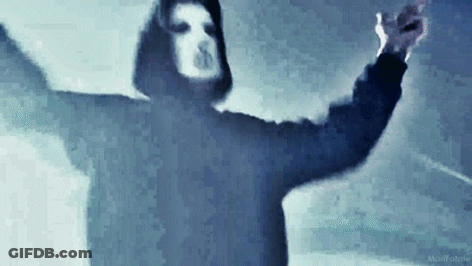 Hooded Person With Mask Dancing In Dark GIF