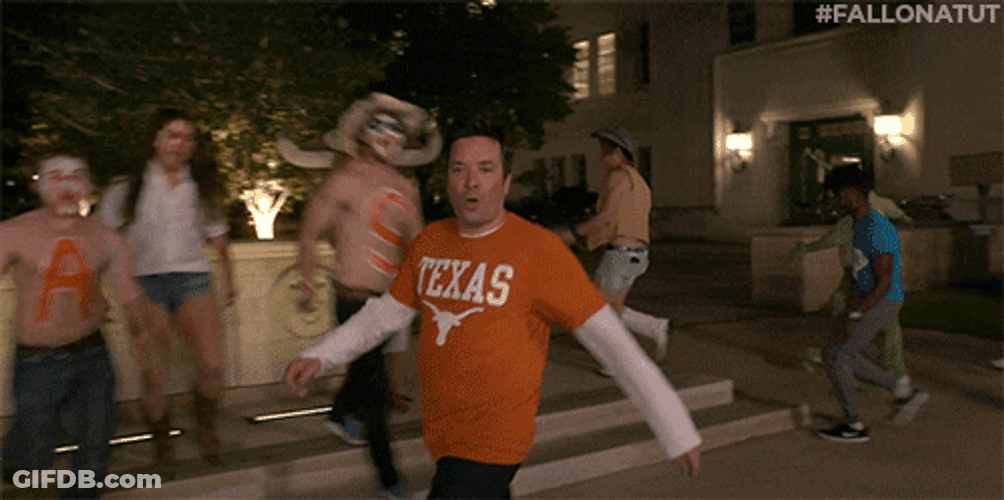 Hook Em Fan Painted Their Body Saying Texas GIF