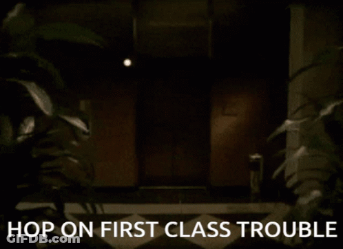 Hop On First Class Trouble Sign GIF