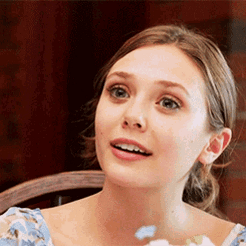 Hopeful Elizabeth Olsen Stare GIF