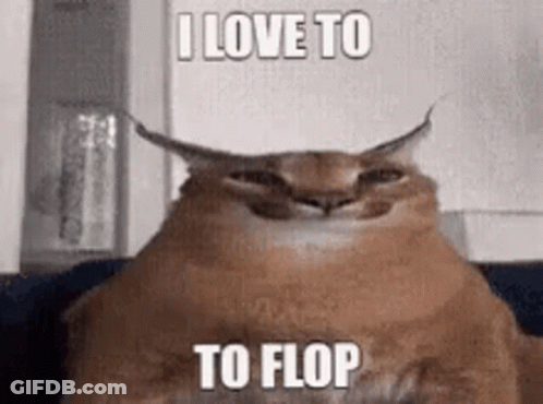 Horned Cat Smiling On Couch GIF