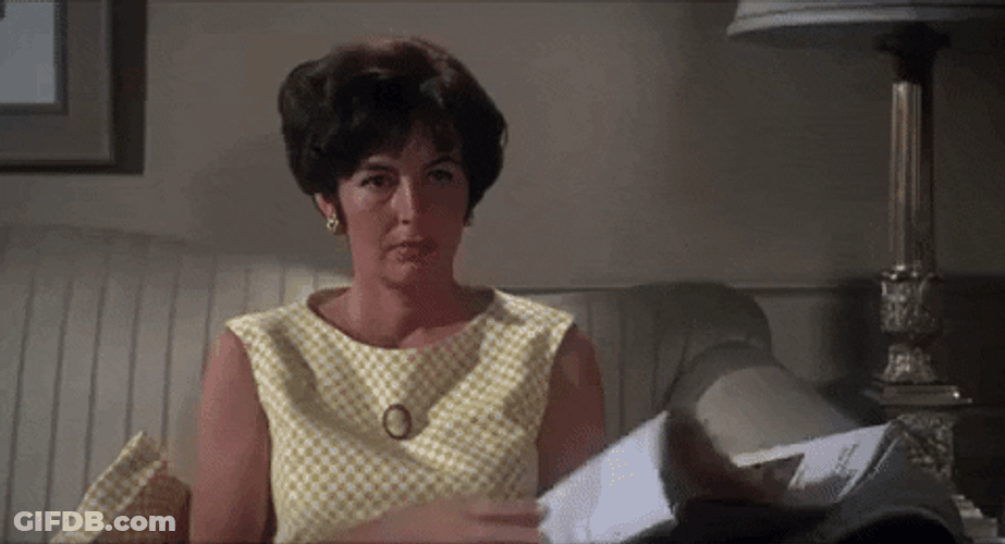 Horror Magazine Reading GIF