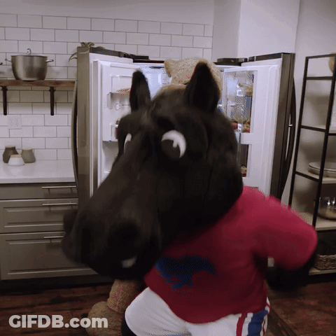 Horse Mascot Standing In Front Of Refrigerator GIF