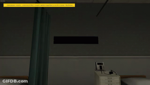 Hospital Room Screenshot With Yellow Warning Sign Above Bed GIF