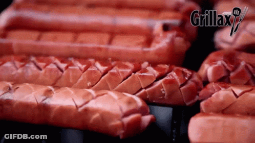 Hot Dogs Cooking On Grill With Grillax Logo GIF