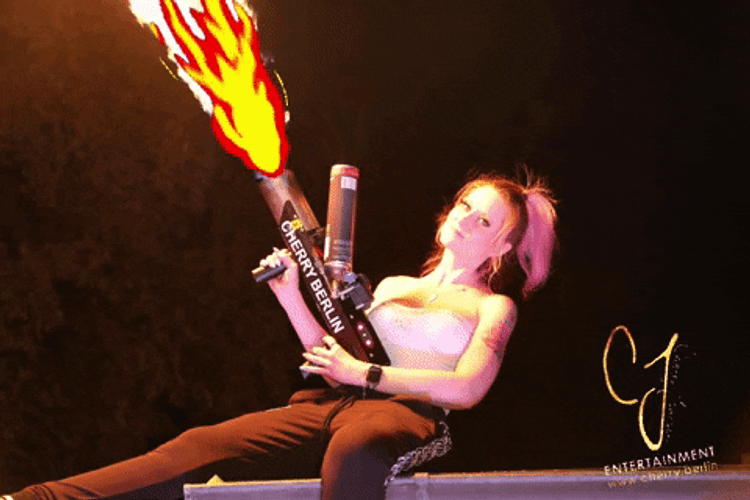 Hot Girl Using Flamethrower GIF