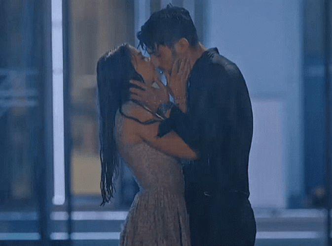 Hot Kiss In Pouring Rain GIF