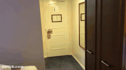 Hotel Room Door With No Smoking Sign GIF