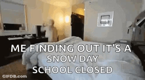 Hotel Room With Bed And Sign Saying Snow Day School Closed GIF