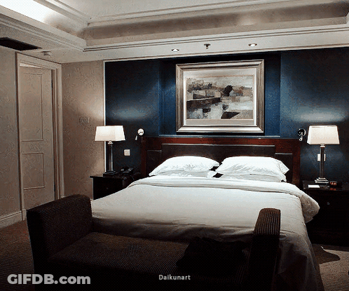 Hotel Room With Large Bed And Painting GIF