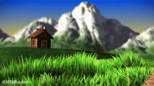 House In Grassy Field With Mountains GIF