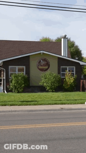 House With Coffee House Sign GIF