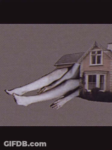 House With Person's Legs Coming Out GIF