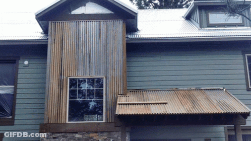 House With Tin Roof And Window GIF