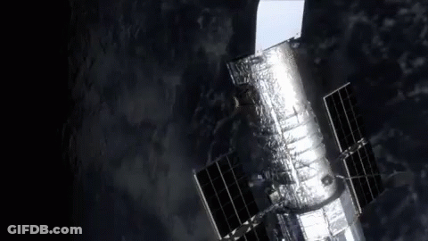 Hubble Space Telescope Flying Through Space GIF