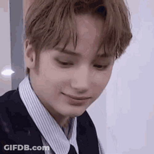 Huening Kai Looking Around GIF