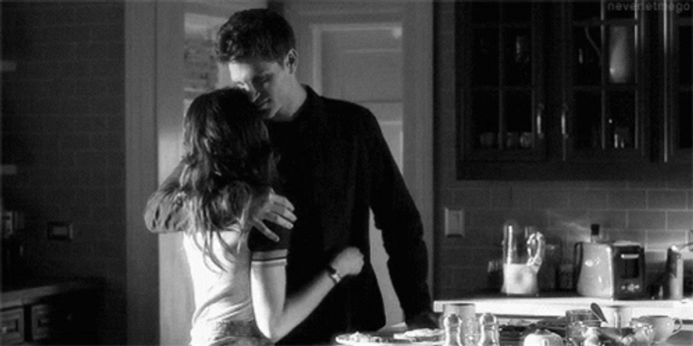 Hug Romantic Couple On The Kitchen GIF