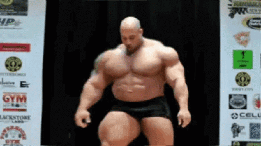 Huge Man Flexing Whole Body Muscle Growth GIF