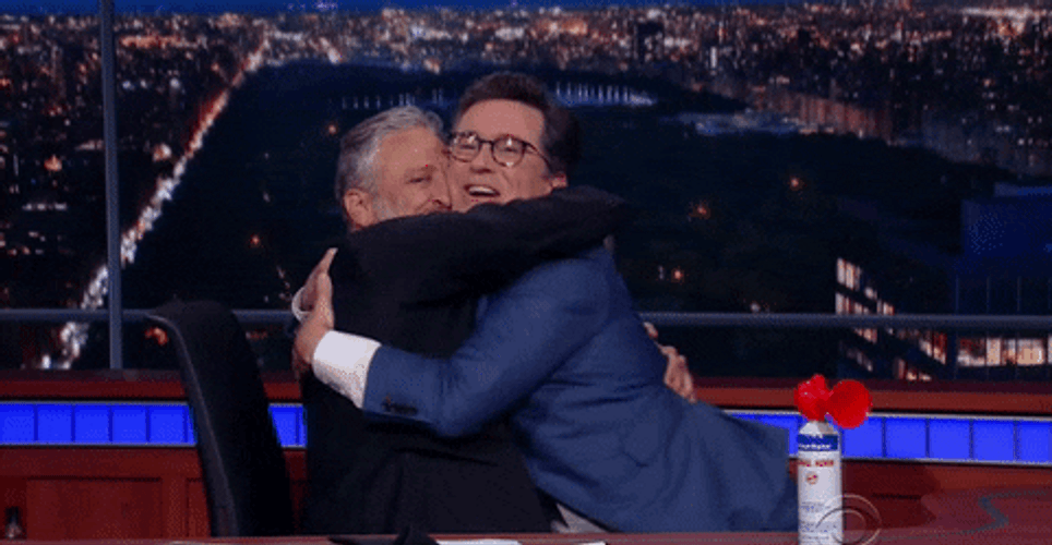 Hugging Happy Stephen Colbert GIF