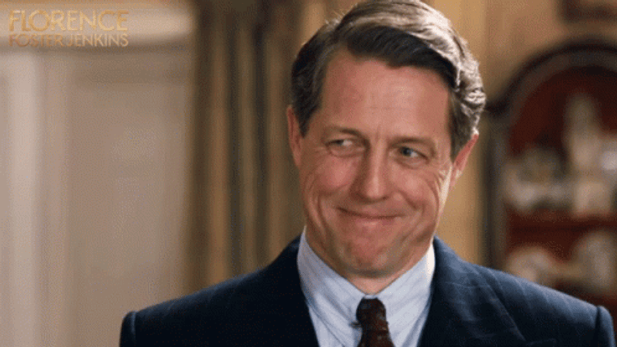 Hugh Grant Agreeing Smile GIF