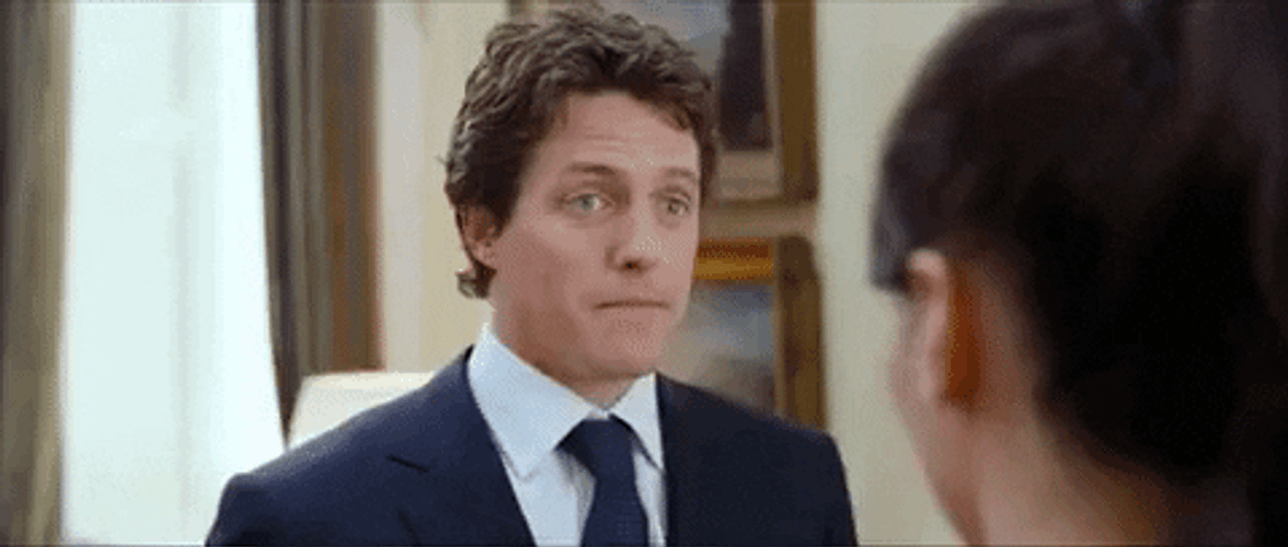 Hugh Grant Awkwardly Nods GIF