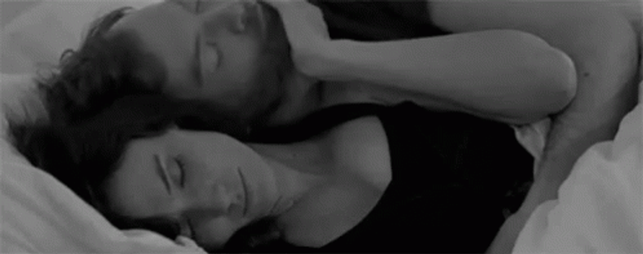 Hugs And Kisses While Lying GIF