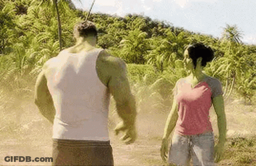 Hulk And Woman Standing In Field GIF