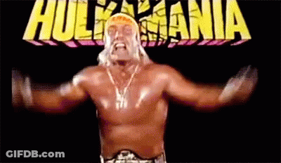 Hulk Hogan Is A Wrestler With His Arms Outstretched In Front Of A Hulkmania Logo . GIF