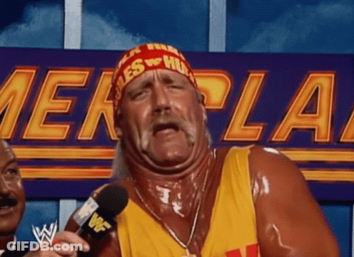 Hulk Hogan Is Talking Into A Microphone In Front Of A Sign That Says ' WWE ' On It . GIF