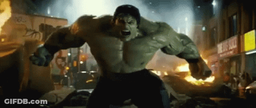 Hulk Standing In City With Fist Out GIF