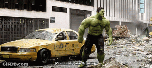 Hulk Standing In Front Of Destroyed NYC Taxi GIF