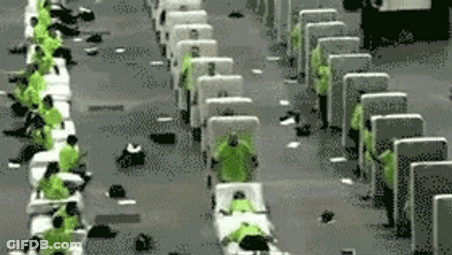 Human Dominos Falling Mattress GIF