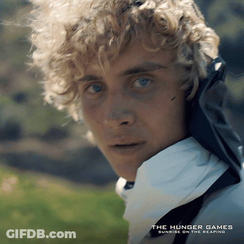 Hunger Games Poster With Blonde Man GIF