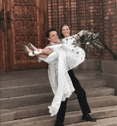 Husband Carrying His Wife After Marriage GIF