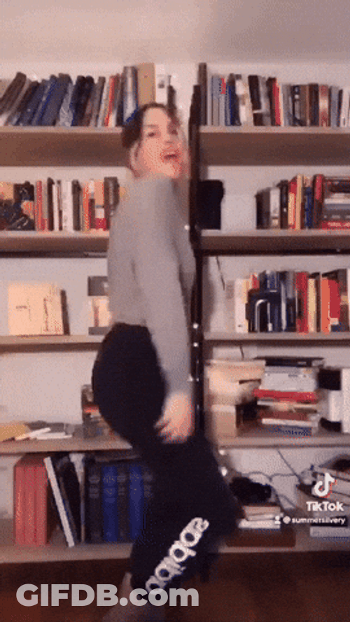 Hyper Lady Jumping Inside Her Room GIF