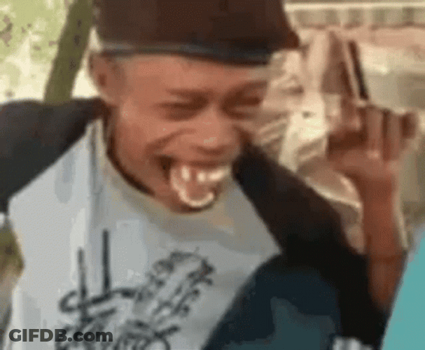 Hysterical Buck Teeth Laughing Meme GIF