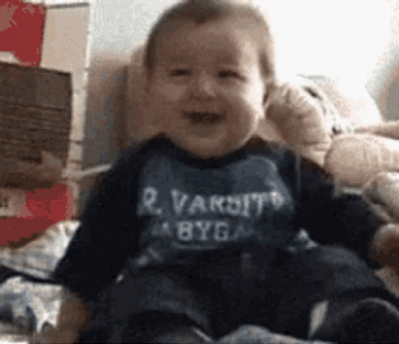 Hysterical Laughing Baby Falling Over GIF