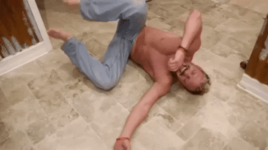 Hysterical Laughing Floor Rolling GIF