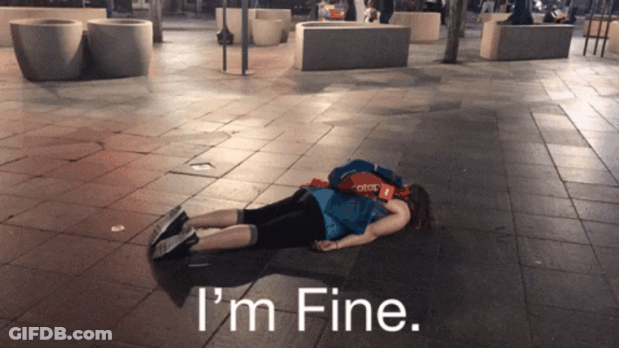 I'm Fine Lay On The City Street GIF