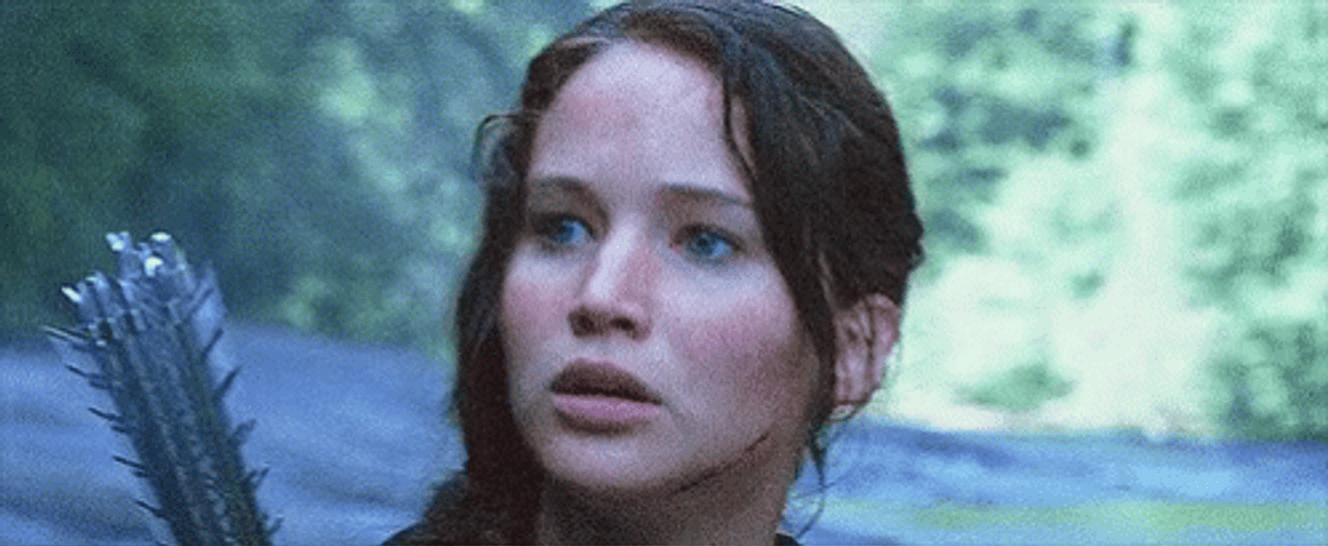 I Volunteer As Tribute Katniss Everdeen Looking Around GIF