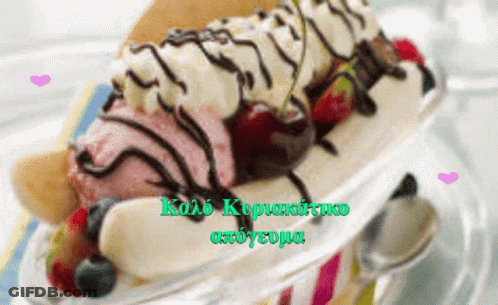 Ice Cream Sundae With Berries And Chocolate GIF
