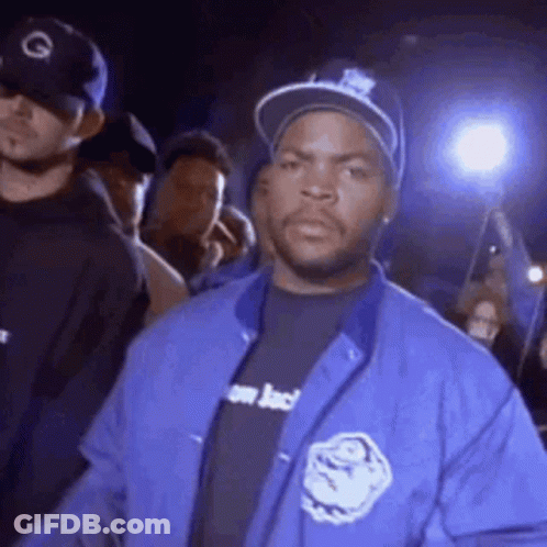 Ice Cube In Blue Jacket And Hat Before Crowd GIF