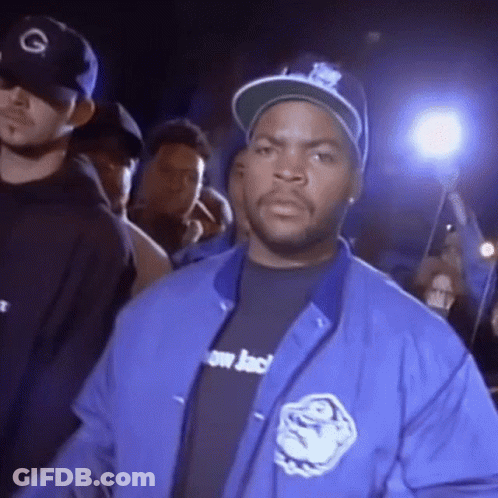Ice Cube In Blue Jacket And Hat With Crowd GIF