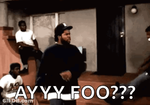 Ice Cube Is Standing In Front Of A Group Of Men And Says Ayy Foo GIF