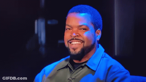 Ice Cube Looking At Camera In Blue Light GIF