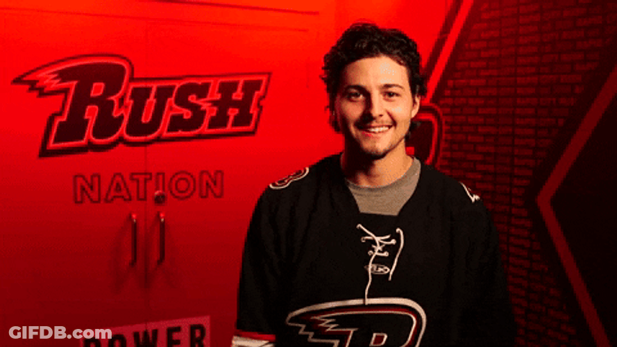 Ice Hockey Player Shrugs GIF